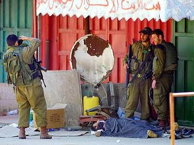 [Israeli_soldiers_Pal_corpse.jpg]